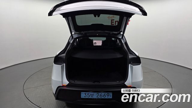 Tesla Model Y 2025 — photo 26