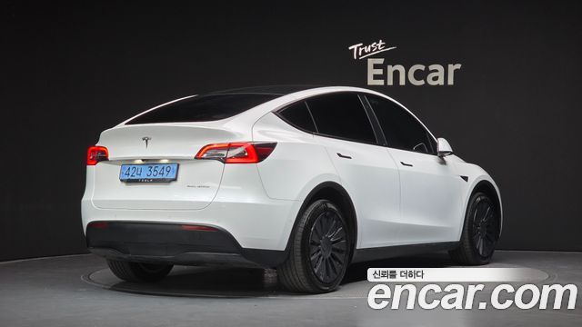 Tesla Model Y 2022 — photo 2