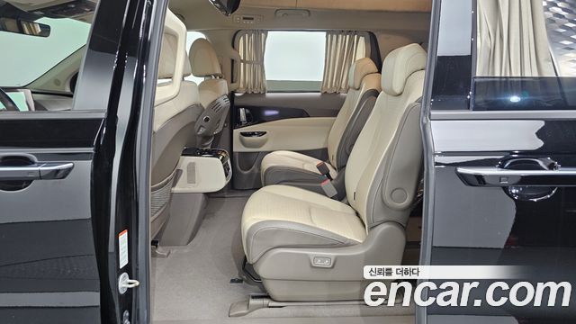 Kia Canival 2023 — photo 11