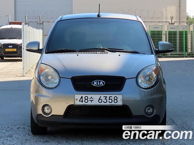 Kia morning 2011 — photo 1