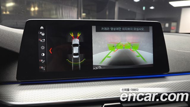 BMW 5-Series 2018 — photo 22