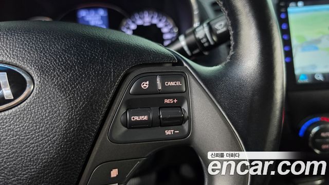 Kia K3 2013 — photo 21