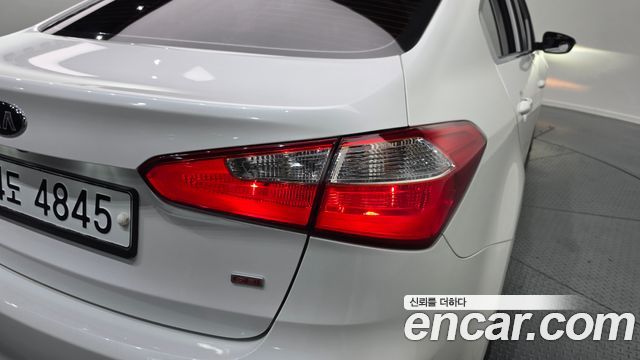 Kia K3 2013 — photo 9