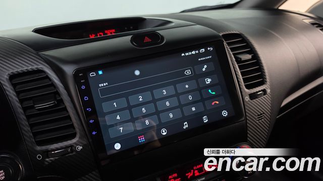Kia K3 2013 — photo 28