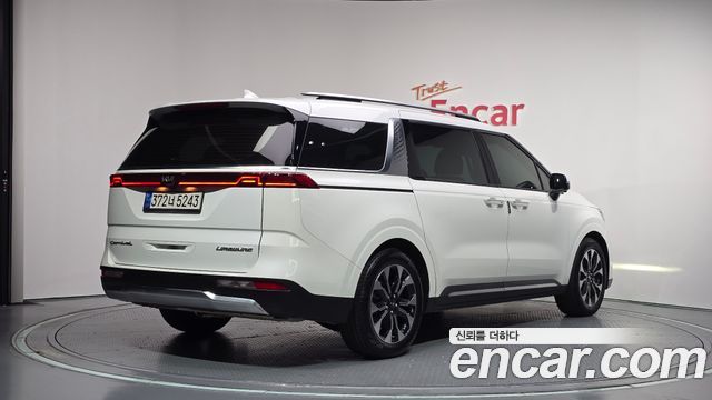 Kia Canival 2021 — photo 2