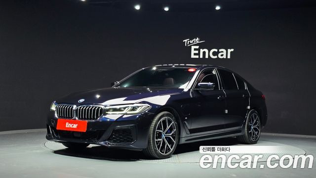 BMW 5-Series 2023 — photo 1