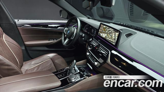 BMW 5-Series 2023 — photo 20