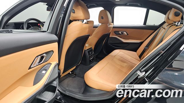 BMW 3-Series 2024 — photo 18