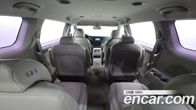 Kia Canival 2015 — photo 20