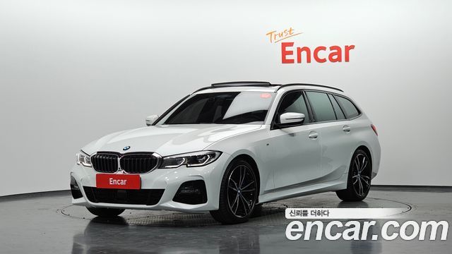 BMW 3-Series 2022 — photo 1