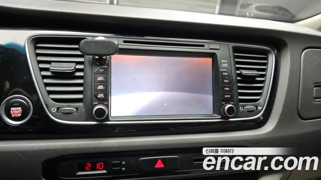 Kia Canival 2015 — photo 20