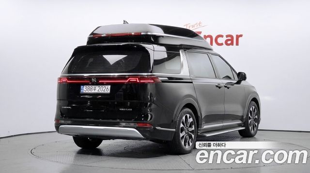 Kia Canival 2023 — photo 2