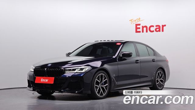 BMW 5-Series 2021 — photo 1