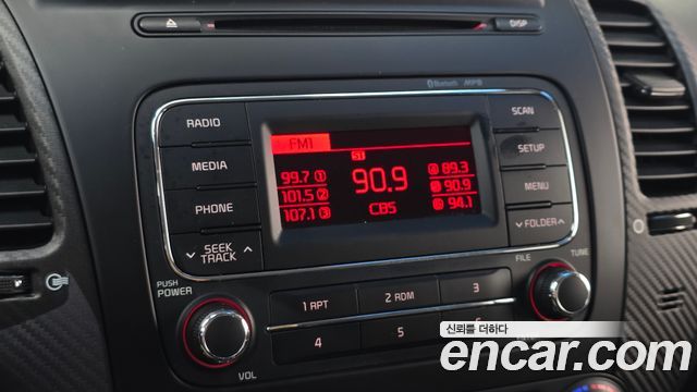 Kia K3 2013 — photo 18