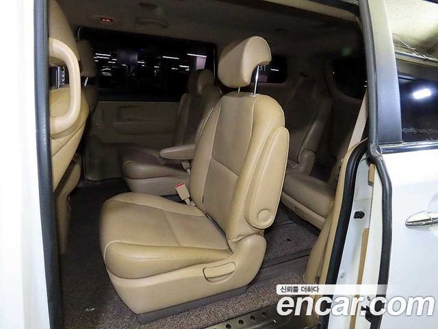 Kia Canival 2015 — photo 7