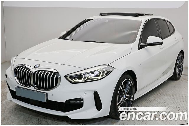 BMW 1-Series 2021 — photo 1