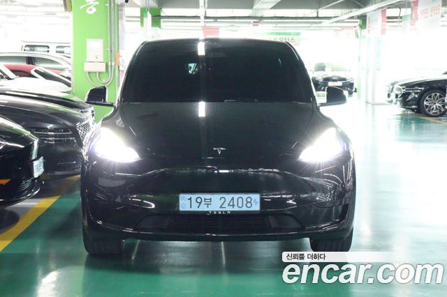 Tesla Model Y 2024 — photo 3