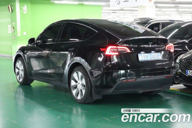 Tesla Model Y 2024 — photo 5