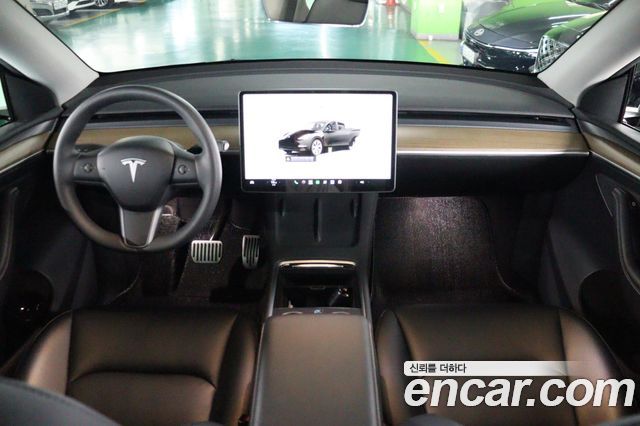 Tesla Model Y 2024 — photo 7