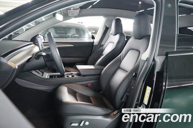 Tesla Model Y 2024 — photo 8