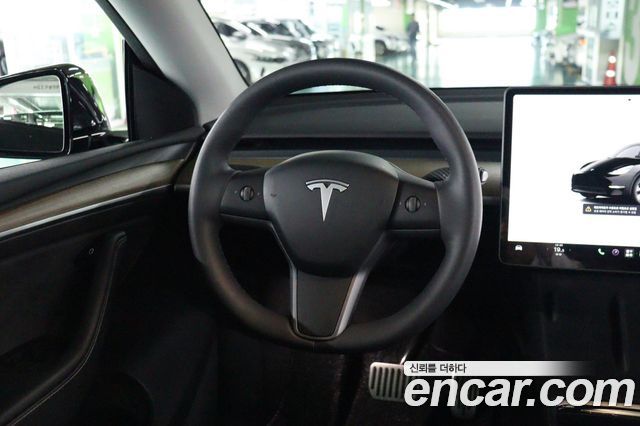 Tesla Model Y 2024 — photo 11