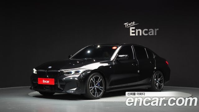 BMW 3-Series 2023 — photo 1