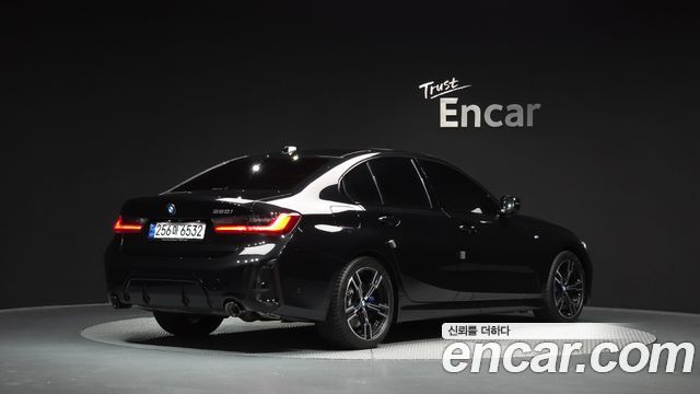 BMW 3-Series 2023 — photo 2