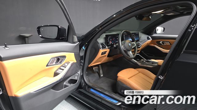BMW 3-Series 2023 — photo 10