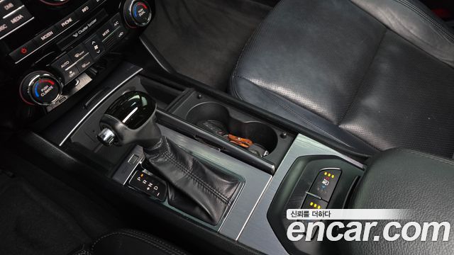 Kia K7 2011 — photo 9