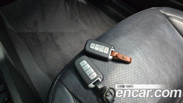 Kia K7 2011 — photo 16
