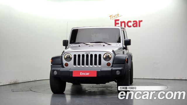 Jeep Wrangler 2010 — photo 3