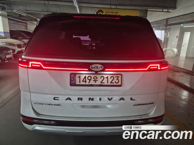 Kia Canival 2021 — photo 2