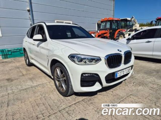 BMW X3 2021 — photo 1