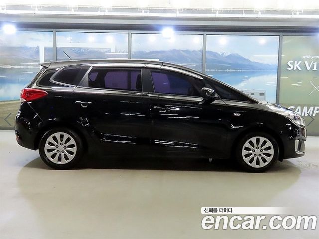 Kia Carens 2014 — photo 4