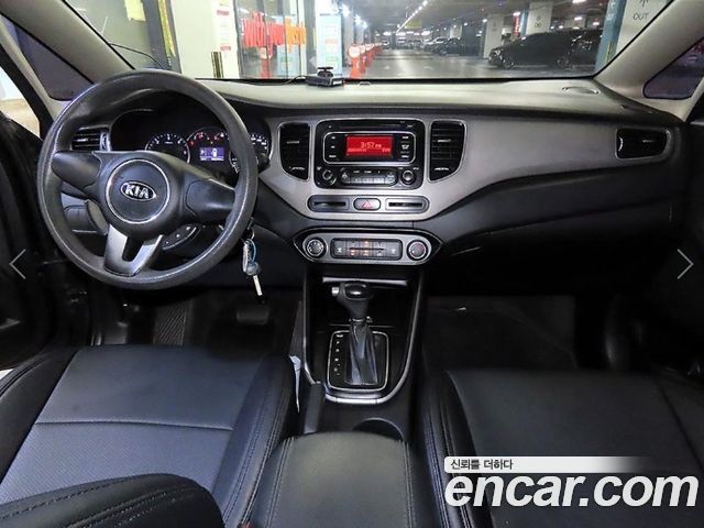 Kia Carens 2014 — photo 11