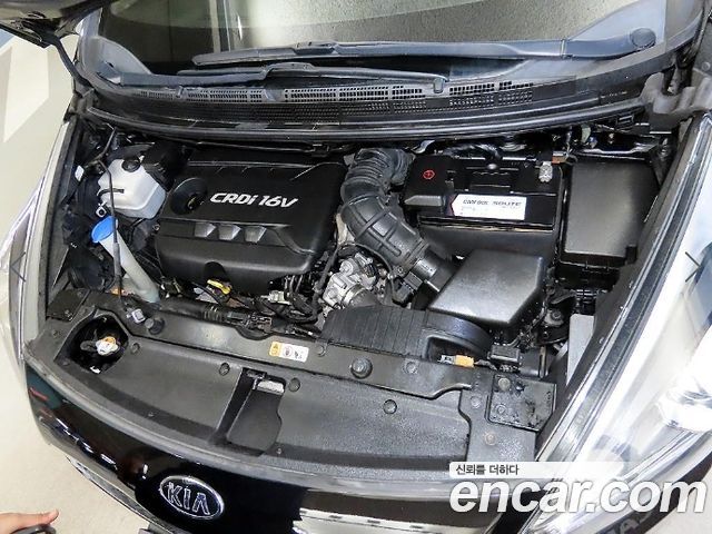 Kia Carens 2014 — photo 19