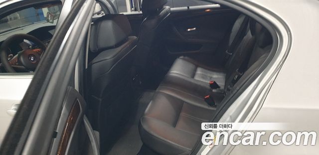 BMW 5-Series 2009 — photo 7