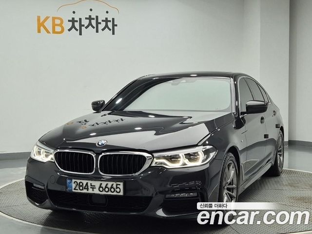 BMW 5-Series 2020 — photo 1