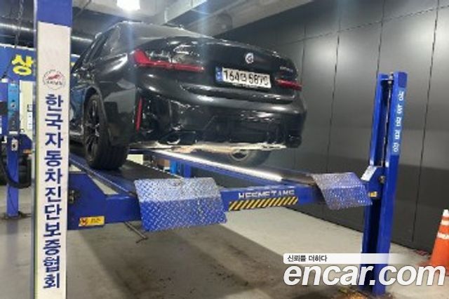 BMW 3-Series 2023 — photo 2