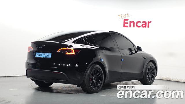 Tesla Model Y 2024 — photo 2