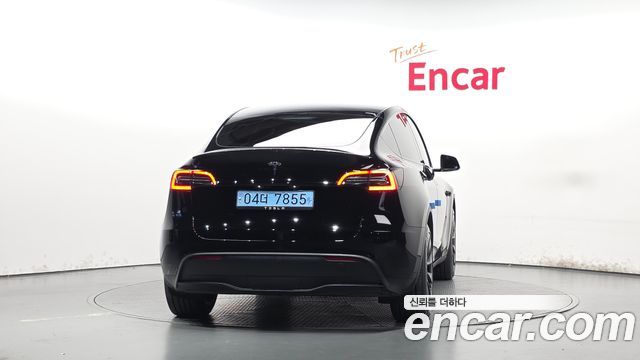 Tesla Model Y 2024 — photo 4