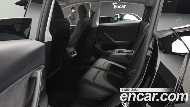 Tesla Model Y 2024 — photo 11