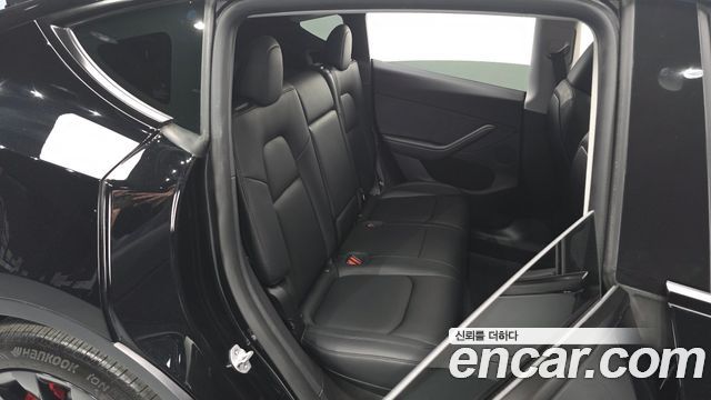 Tesla Model Y 2024 — photo 12