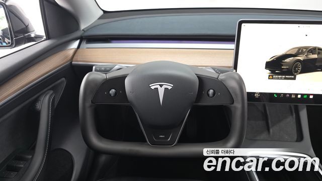 Tesla Model Y 2024 — photo 13