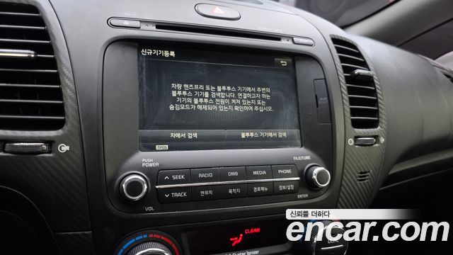 Kia K3 2015 — photo 21