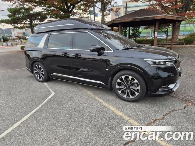 Kia Canival 2023 — photo 3