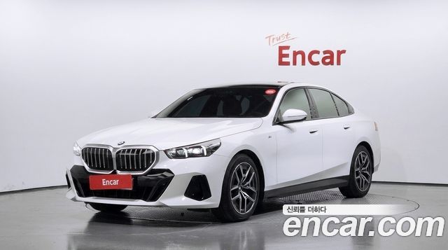 BMW 5-Series 2024 — photo 1