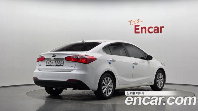 Kia K3 2013 — photo 2