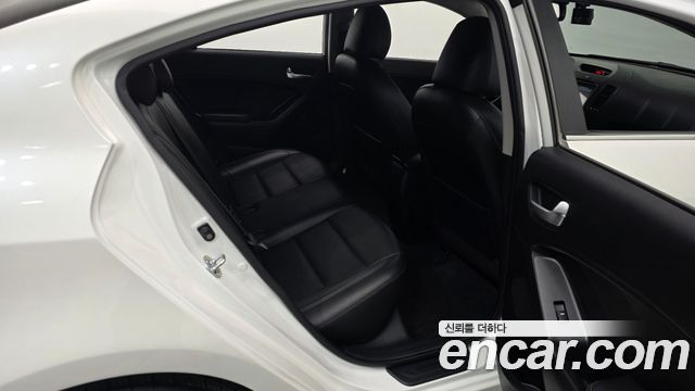 Kia K3 2013 — photo 18