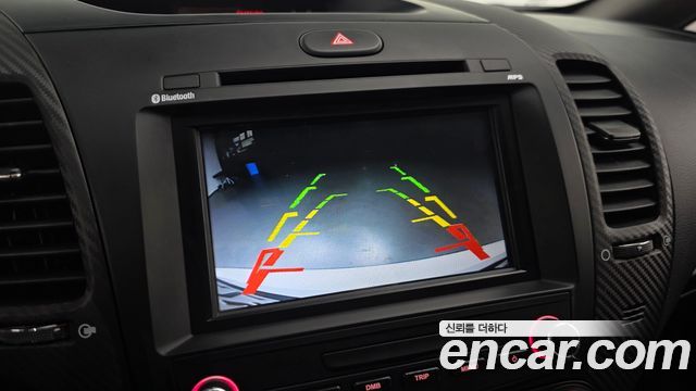 Kia K3 2013 — photo 21